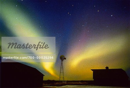 Northern Lights With Silhouette Of Barn And Windmill Alberta