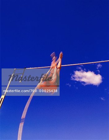 Blurred View of Man High Jumping