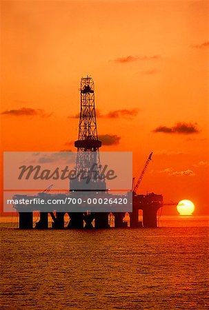Silhouette of Offshore Oil Rig at Sunset Malaysia
