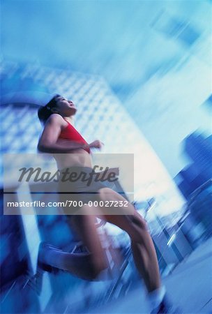 Blurred View of Woman Running Outdoors