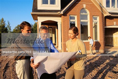 People Looking at Blueprints for Home, Burlington, Ontario, Canada