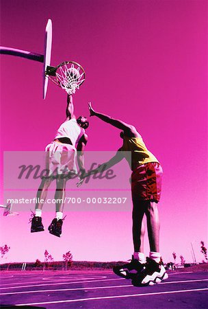 Men Playing Basketball Outdoors