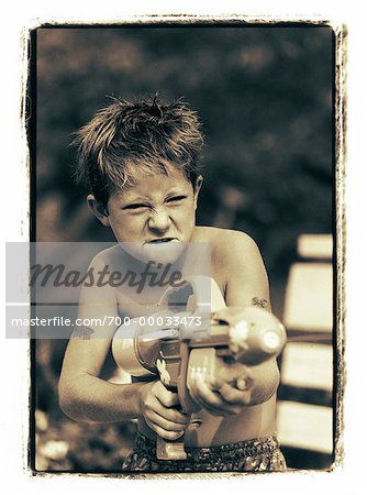 Boy Holding Water Gun