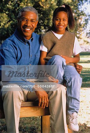 Portrait of Father and Daughter Outdoors