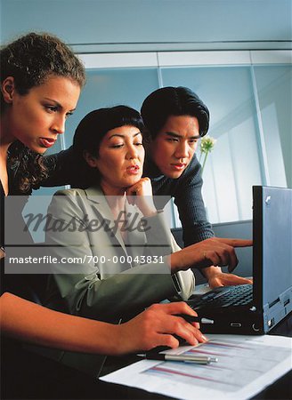 Business People Using Laptop Computer