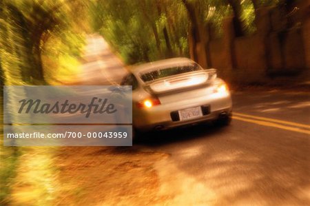 Blurred View of Car on Country Road