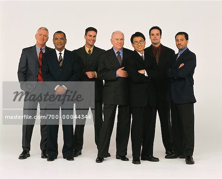 Short and Tall Businessmen - Stock Photo - Masterfile - Premium