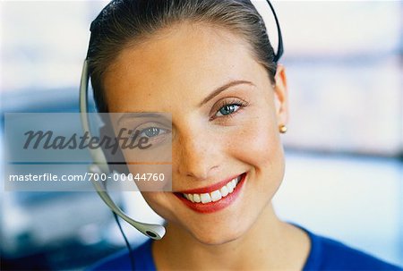 Portrait of Woman Wearing Telephone Headset