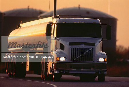 Fuel Truck on Road at Sunset