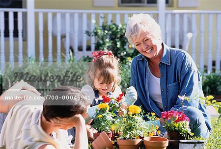 Grandmother, Mother and Daughter In Garden