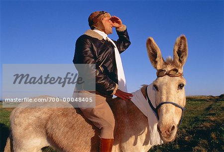 700-00048405em-pilot-riding-donkey-stock-photo.jpg