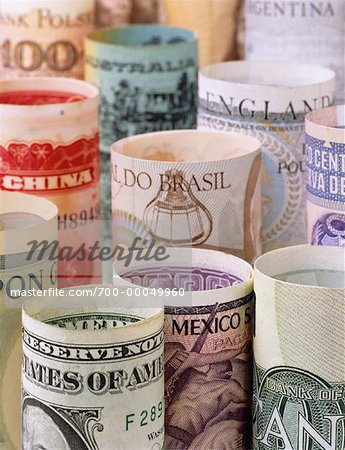 Close-Up of Rolls of International Currency