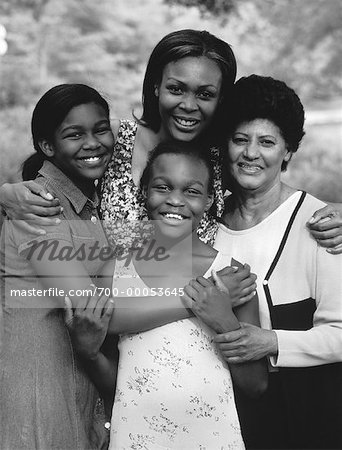 Portrait of Grandmother, Mother And Daughters Outdoors