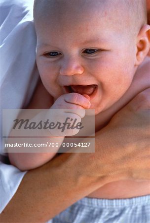 Close-Up of Mother Holding Baby