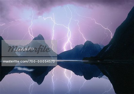 Lightning over Mountains and Lake Milford Sound, South Island New Zealand