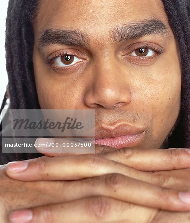 Close-Up of Man with Clasped Hands