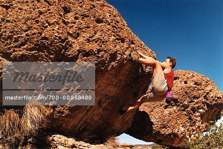 Man Rock Climbing