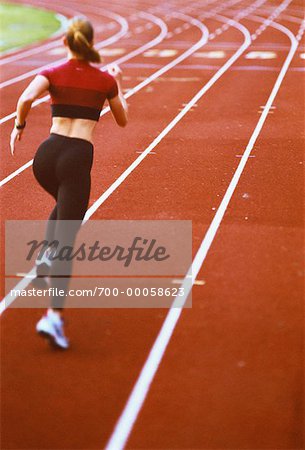 Back View of Woman Running on Running Track - Stock Photo - Masterfile -  Rights-Managed, Artist: Peter Barrett, Code: 700-00058623