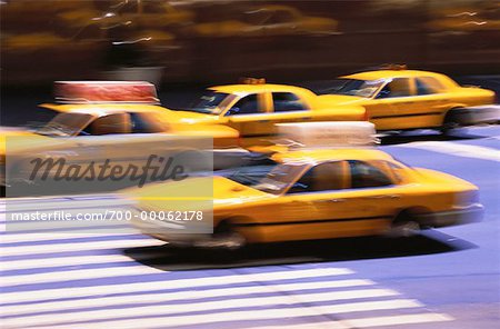 Blurred Taxis on Street New York, New York, USA