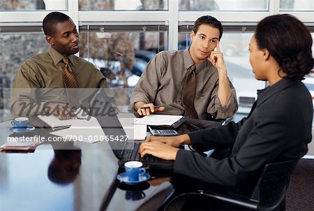 Business People Working in Boardroom