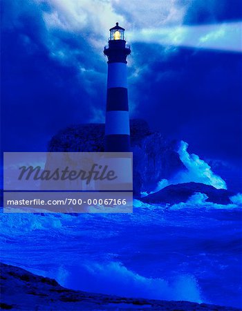 Lighthouse and Crashing Waves At Night