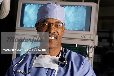 Portrait of Mature Male Doctor With Stethoscope and Mask