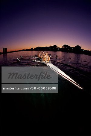 Female Rowers at Dusk