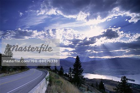 Road and Landscape with Sun Through Clouds, Okanagan Valley British Columbia, Canada