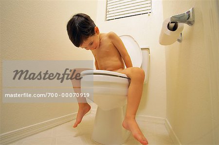 Nude Boy Sitting on Toilet