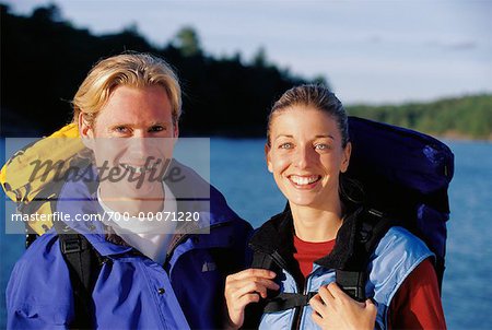 Portrait of Couple with Hiking Gear near Lake Haliburton, Ontario, Canada