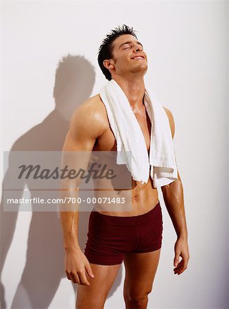 https://image1.masterfile.com/getImage/700-00071483em-man-with-towel-around-neck-perspiring-stock-photo.jpg