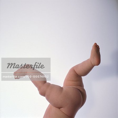 Nude Baby's Legs and Feet Kicking
