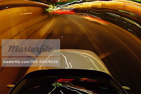 Blurred View of Highway Traffic With Light Trails at Night
