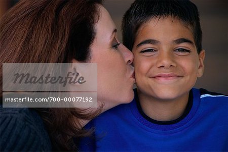 Mother Kissing Son on Cheek