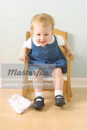 Girl Sitting In Potty Chair Stock Photo Masterfile Rights