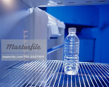 https://image1.masterfile.com/getImage/700-00077879em-bottle-of-water-in-fridge-stock-photo.jpg