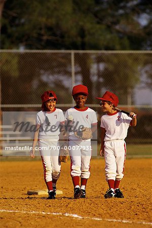 Little League Baseball Players On Baseball Diamond