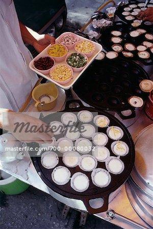 Close-Up of Person Preparing Food On Tray Bangkok, Thailand