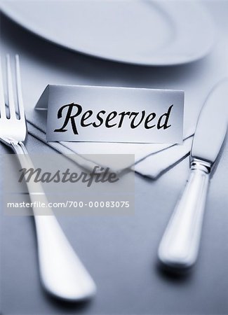 Place Setting with Reserved Sign
