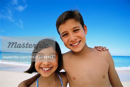 Portrait of Boy and Girl on Beach