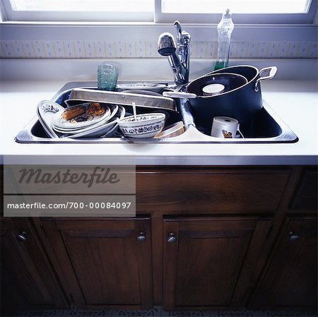 https://image1.masterfile.com/getImage/700-00084097em-dirty-dishes-in-sink-stock-photo.jpg