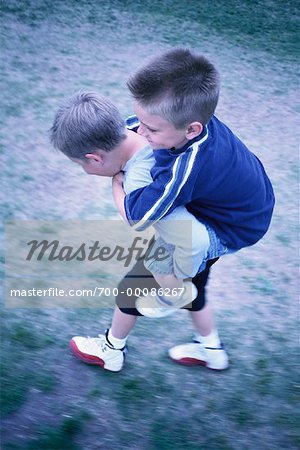 Two Boys Playing Outdoors