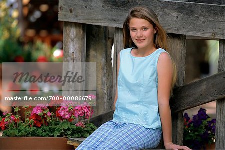 Portrait of Girl Sitting Outdoors