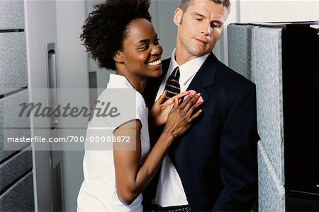 Woman Flirting with Man in Office