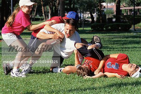 Family Playing Football