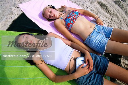 7 and 11 year old girls sunbathing, Stock Photo, Picture And Royalty Free  Image. Pic. LPX-U13743296