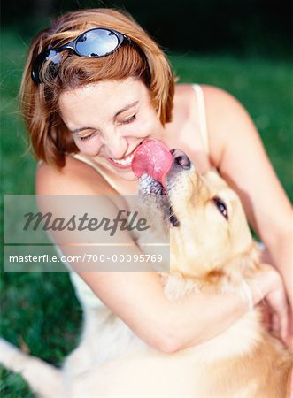 Dog Licking Woman's Face