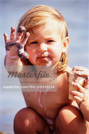 Child Eating Ice Cream Cone