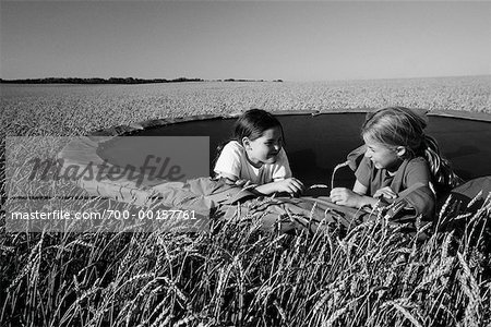 Girls on Trampoline in Wheatfield