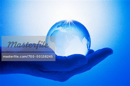 Hand Holding Glass Globe Showing Middle East